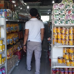 Pet House - Fully stocked shelves of dog and cat treats, accessories.