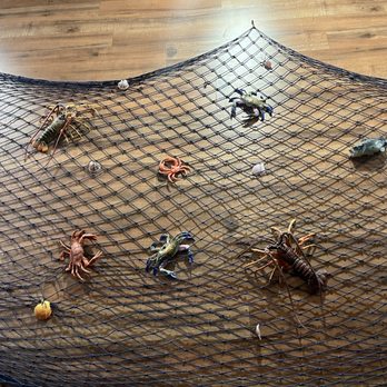Craving Crab - Wall decor is so cool - Seafood Near Me - Weatherford, Texas