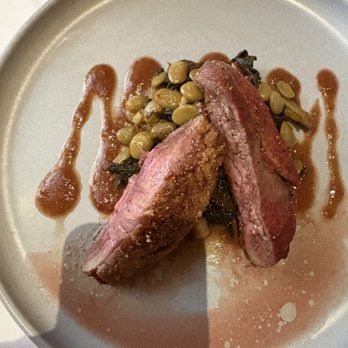 Oak Steakhouse - Duck breast with collards and butterbeans - Steakhouses Near Me - Charleston, South Carolina Oak Steakhouse - Duck breast with collards and butterbeans - Steakhouses Near Me - Charleston, South Carolina
