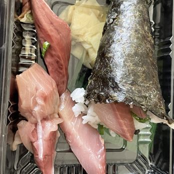 Red Maple - Yellowtail Scallion Roll hand roll full of thick fat strings that you can't bite through and the dark discoloration and mushy texture - Sushi Bars Near Me - Silver Spring, Maryland