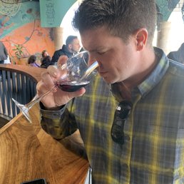 Enjoying a glass of cab in the tasting room Enjoying a glass of cab in the tasting room