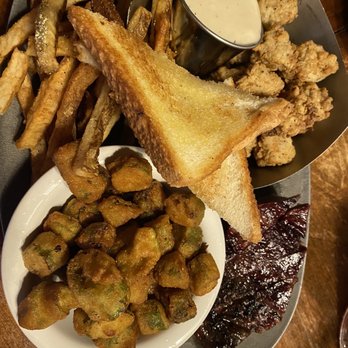 Clark's Outpost Restaurant - Calf fries meal with sliced brisket and two sides: French fries and fried okra. - Barbeque Near Me - Tioga, Texas Clark's Outpost Restaurant - Calf fries meal with sliced brisket and two sides: French fries and fried okra. - Barbeque Near Me - Tioga, Texas