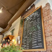 Photo of Brothers & Sisters Co Coffeehouse + Cafe - Brookline, MA, United States. The extensive drinks menu / Dec. 2022