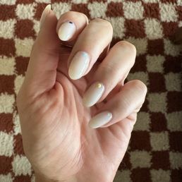 BioGel milky manicure with little color dots for a pop of color.