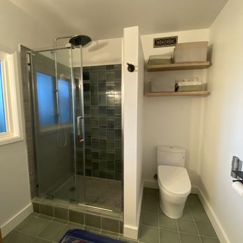 GT Renovations - a bathroom with a toilet and shower - General Contractors Near Me GT Renovations - a bathroom with a toilet and shower - General Contractors Near Me