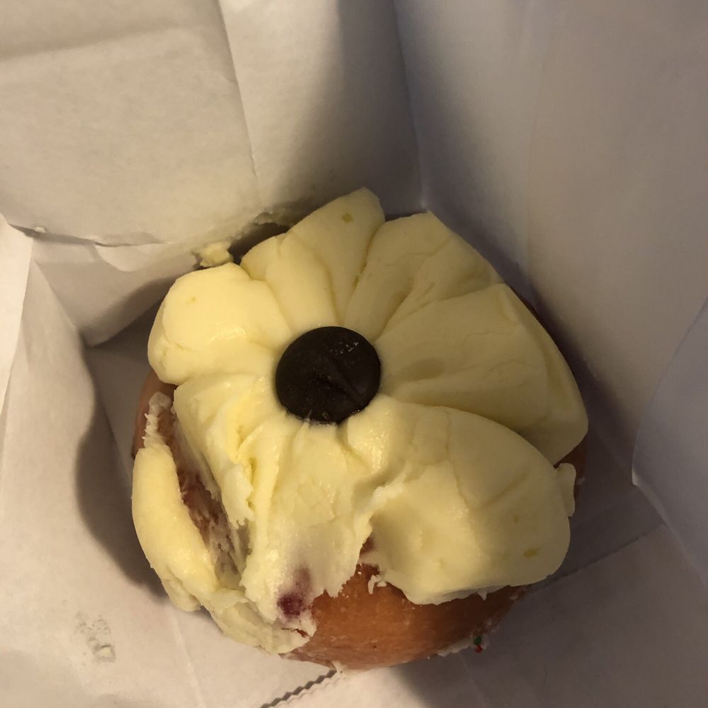 Cherry cake donut with cream cheese icing