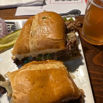Oddfellas Pub & Eatery - Pot Roast Philly Sandwich with coleslaw - Irish Near Me - Auburn, Washington Oddfellas Pub & Eatery - Pot Roast Philly Sandwich with coleslaw - Irish Near Me - Auburn, Washington