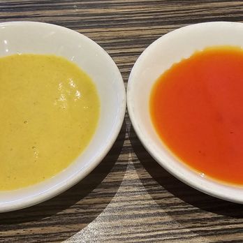 Dynasty - Two saices for egg rolls. Left is a mustarfd sauce, right is a sweet sauce. - Seafood Near Me - Orange, California