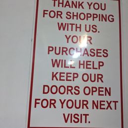 a red and white sign that says thank you for shopping with us a red and white sign that says thank you for shopping with us