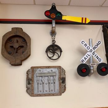 The Junction - a railroad crossing sign and other items - American Near Me - Newton, Mississippi The Junction - a railroad crossing sign and other items - American Near Me - Newton, Mississippi