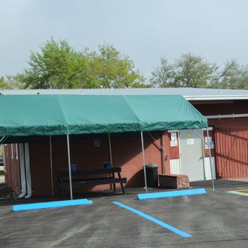 Main Street Tap Room - Preparing for the summer heat/rain with a canopy out back for the smoking contingent! Can you say hurricane magnet! - Sports Bars Near Me - Avon Park, Florida Main Street Tap Room - Preparing for the summer heat/rain with a canopy out back for the smoking contingent! Can you say hurricane magnet! - Sports Bars Near Me - Avon Park, Florida