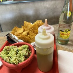 Marmelly - Fresh made quacamole, warm chips, two salsas