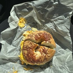 Sausage egg and cheese on an Asiago bagel