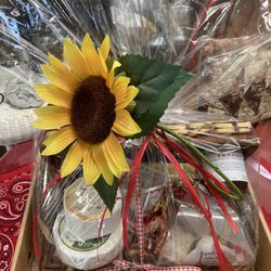 Edie Gourmet Fromagerie - Edie likes sunflowers and wraps gifts beautifully.