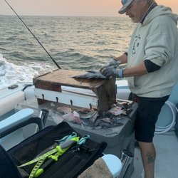 Starship Charters - James filleting our catches!