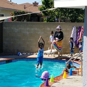 Teddi Bear Swim School - Ian diving under two watchful instructors. 4th day of class. - Swimming Lessons/Schools Near Me - Cypress, California