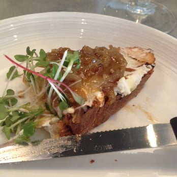 Bravas Bar de Tapas - Tostada: Goat cheese, golden onions, truffled honey - Spanish Near Me - Healdsburg, California Bravas Bar de Tapas - Tostada: Goat cheese, golden onions, truffled honey - Spanish Near Me - Healdsburg, California