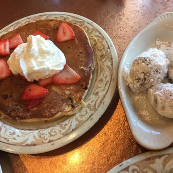 Another Broken Egg Cafe - Can't just have the savory brunch- I must have sweet as well- the mixed berry pancake side and a side order of beignets - Breakfast & Brunch Near Me - Winter Park, Florida Another Broken Egg Cafe - Can't just have the savory brunch- I must have sweet as well- the mixed berry pancake side and a side order of beignets - Breakfast & Brunch Near Me - Winter Park, Florida