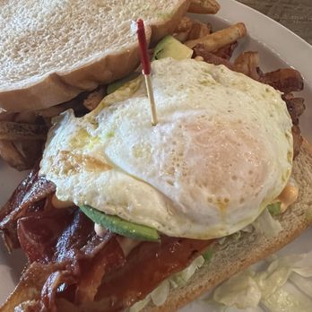 La Vernia's Den - BLT+Avocado with fried egg and French fries on lightly toasted sourdough. - Burgers Near Me - La Vernia, Texas La Vernia's Den - BLT+Avocado with fried egg and French fries on lightly toasted sourdough. - Burgers Near Me - La Vernia, Texas