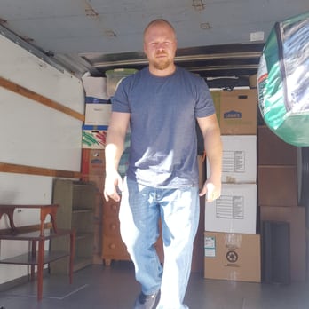 Helping Hands Moving Service - Just finished stuffing cardboard between two dressers so they don't scar each other up during the ride across town! - Movers Near Me - Columbus, Georgia