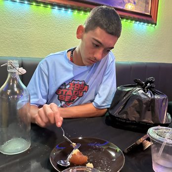Namaste Miami - Enjoying his Gulab Jamun - Indian Near Me - Miami, Florida Namaste Miami - Enjoying his Gulab Jamun - Indian Near Me - Miami, Florida