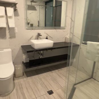 Liberty View Brooklyn Hotel - Huge bathroom with shower. - Hotels Near Me - Brooklyn, New York Liberty View Brooklyn Hotel - Huge bathroom with shower. - Hotels Near Me - Brooklyn, New York