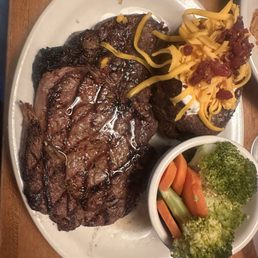 Ribeye with loaded potato and fresh Steamed Vegetables