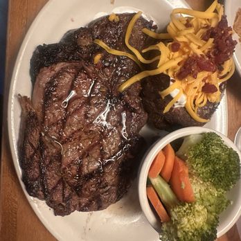 Texas Roadhouse - Ribeye with loaded potato and fresh Steamed Vegetables - Steakhouses Near Me - Frederick, Maryland