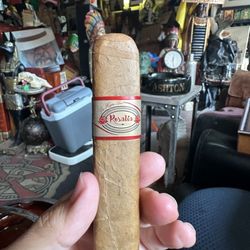 Trading Post Tobacco & Cigars - La Hoja de Rosalia Entubar is a "cigar within a cigar," offering a multi-dimensional smoking experience that sets it apart.