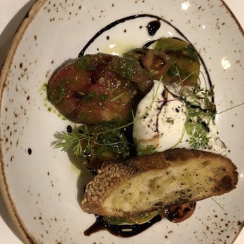 Primo - Heirloom Tomato and Burrata salad - Italian Near Me - Orlando, Florida Primo - Heirloom Tomato and Burrata salad - Italian Near Me - Orlando, Florida