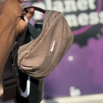 Planet Fitness - My bag. Roughly the size of my hand, smaller than my water bottle behind it. - Gyms Near Me - Long Beach, California