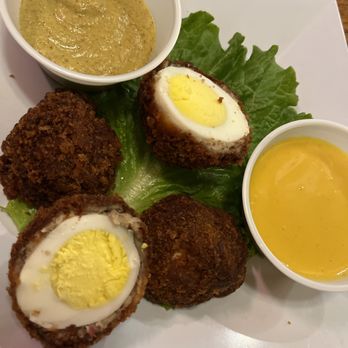 Waxy O'Shea's Irish Pub & Restaurant - Scotch eggs. About a minute overcooked but still tasted good. - Irish Near Me - Branson, Missouri Waxy O'Shea's Irish Pub & Restaurant - Scotch eggs. About a minute overcooked but still tasted good. - Irish Near Me - Branson, Missouri