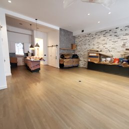 a living room with hardwood floors