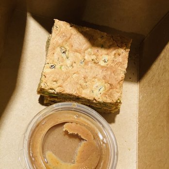 Littler - a container of peanut butter and a piece of cookie - Bars Near Me - Durham, North Carolina