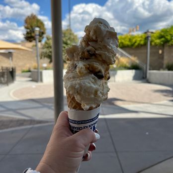 Handel's Homemade Ice Cream - Sandy - a hand holding an ice cream cone - Ice Cream & Frozen Yogurt Near Me - Sandy, Utah Handel's Homemade Ice Cream - Sandy - a hand holding an ice cream cone - Ice Cream & Frozen Yogurt Near Me - Sandy, Utah