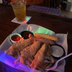 McGuinn's Place - Chicken tenders comes with fries, barbecue sauce and honey mustard. Deliciousness!