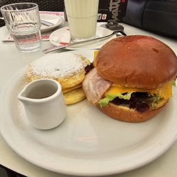 Egg sandwich (no tomato) and pancakes Egg sandwich (no tomato) and pancakes