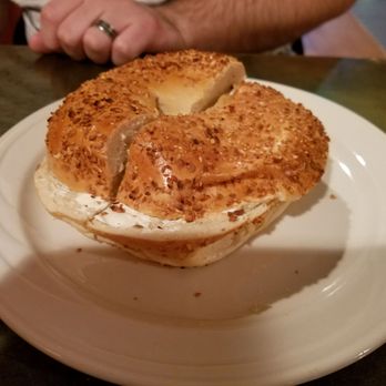Uncommon Grounds - Onion bagel with olive pimento cream cheese - Coffee & Tea Near Me - Albany, New York Uncommon Grounds - Onion bagel with olive pimento cream cheese - Coffee & Tea Near Me - Albany, New York