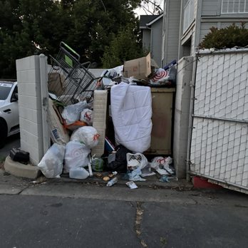 Cascades Apartments - The dumpster divers are constantly here because the trash is never picked up on a weekly basis. - Apartments Near Me - Fresno, California