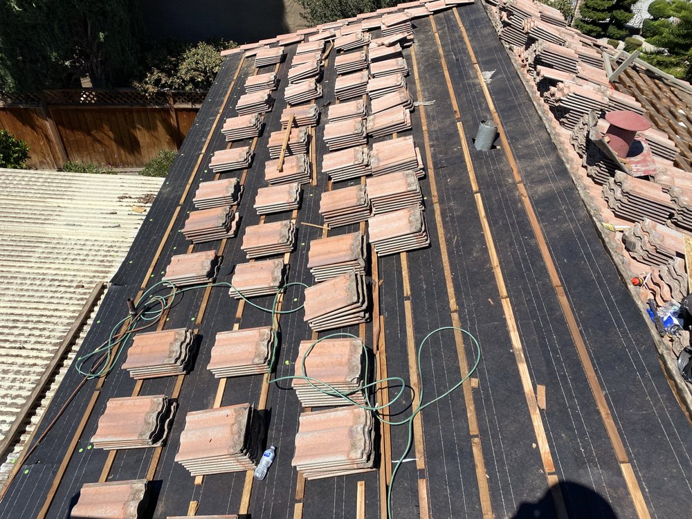 Slide of McGraw and Sons Roofing