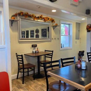 Francesca's On Pawtucket - The old fireplace is gone and the space is much brighter painted creamy white! - American Near Me - Pawtucket, Rhode Island