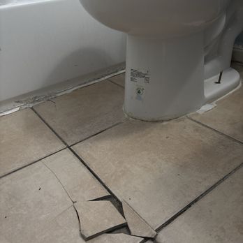 Regency Management - Cracked and broken tiles loose screw to the toilet - Property Management Near Me - El Monte, California