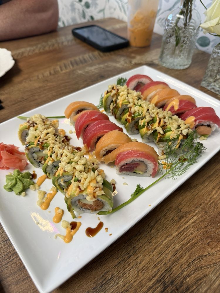 Chin Fusion Restaurant & Sushi Logo