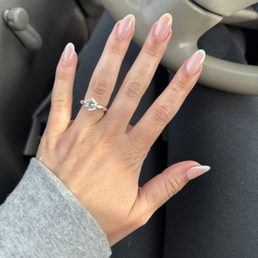 Almond shape, multi color French tip Almond shape, multi color French tip