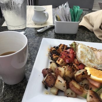 Café Muse - Tofu Breakfast with fingerling potatoes and added an egg over easy - Breakfast & Brunch Near Me - Royal Oak, Michigan Café Muse - Tofu Breakfast with fingerling potatoes and added an egg over easy - Breakfast & Brunch Near Me - Royal Oak, Michigan