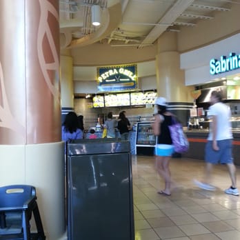 Petra Grill - a group of people walking through a restaurant - Mediterranean Near Me - Woodbridge, Virginia Petra Grill - a group of people walking through a restaurant - Mediterranean Near Me - Woodbridge, Virginia