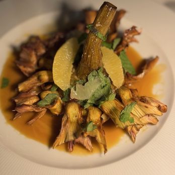Amore Italian Restaurant - FRIED ARTICHOKE Citrus slice, fresh mint, olive oil - Italian Near Me - Houston, Texas Amore Italian Restaurant - FRIED ARTICHOKE Citrus slice, fresh mint, olive oil - Italian Near Me - Houston, Texas