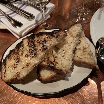 Sotto - Grilled bread with garlic - Italian Near Me - Cincinnati, Ohio Sotto - Grilled bread with garlic - Italian Near Me - Cincinnati, Ohio