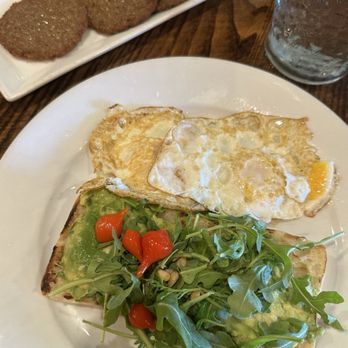 Pairings Bistro - Avocado toast with a side of turkey sausage - Tapas Bars Near Me - Bel Air, Maryland Pairings Bistro - Avocado toast with a side of turkey sausage - Tapas Bars Near Me - Bel Air, Maryland