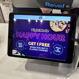 a tablet with a happy hour sign on it a tablet with a happy hour sign on it